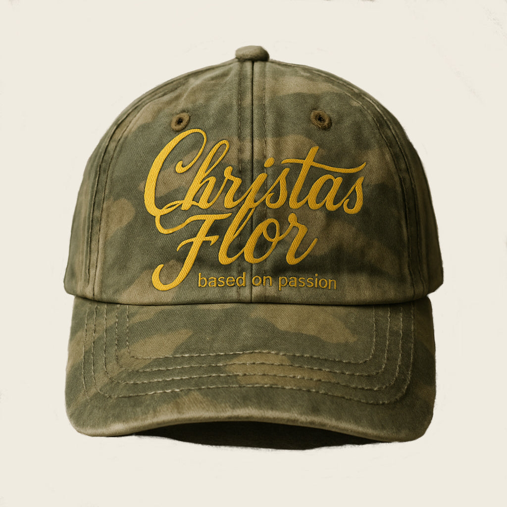 Camouflage colored baseball cap in vintage look with yellow embroidery