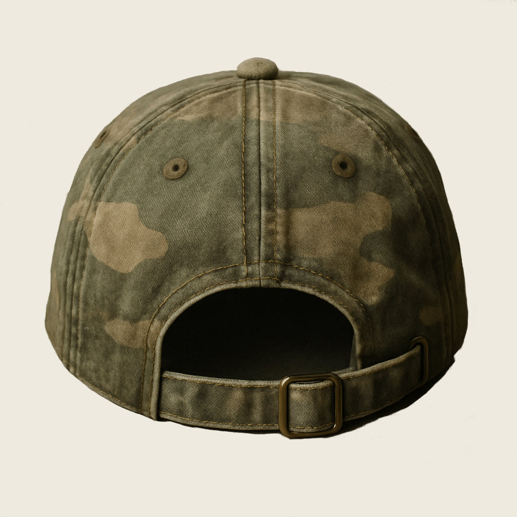 Camouflage colored baseball cap in vintage look with yellow embroidery